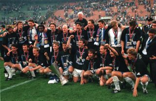 Football. UEFA Cup Final, Second Leg. Milan, Italy. 21st May 1997. Inter Milan 1 v Schalke 04 0 (1-1 on aggregate, after extra time, Schalke win 4-1 on penalties). The Schalke players and officials celebrate with the trophy.