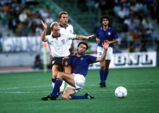 1990 World Cup Third Place Play Off. Bari, Italy. 7th July, 1990. Italy 2 v England 1. England’s Steve McMahon is tackled by Italy’s Carlo Ancelotti.