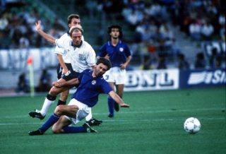 1990 World Cup Third Place Play Off. Bari, Italy. 7th July, 1990. Italy 2 v England 1. England’s Steve McMahon is tackled by Italy’s Carlo Ancelotti.