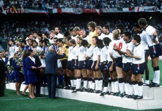 1990 World Cup Third Place Play Off. Bari, Italy. 7th July, 1990. Italy 2 v England 1. FIFA President Joao Havelange presents the England squad with their medals as they stand on the podium after the match.