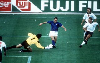 1990 World Cup Third Place Play Off. Bari, Italy. 7th July, 1990. Italy 2 v England 1. Italy’s Salvatore Schillaci takes the ball past England goalkeeper Peter Shilton on his way to setting up the first goal.
